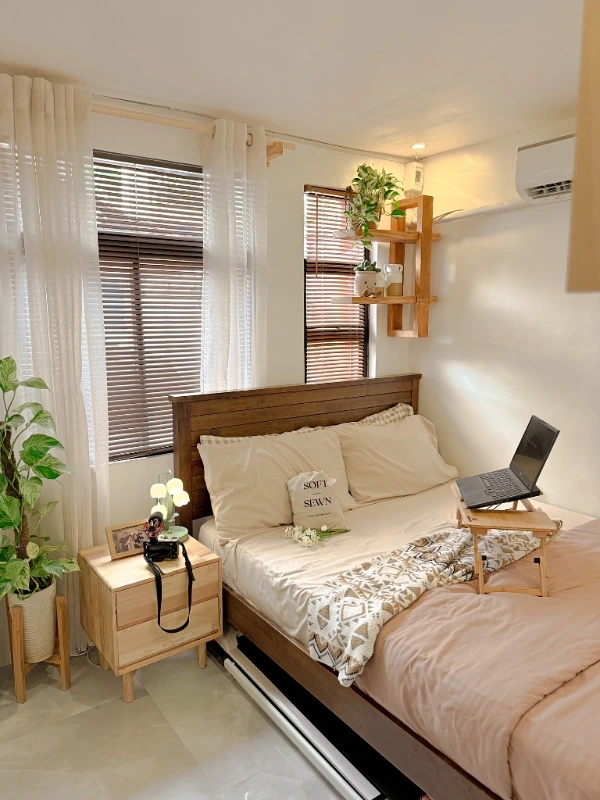 Corner Bed Placement with Floating Wall Shelving