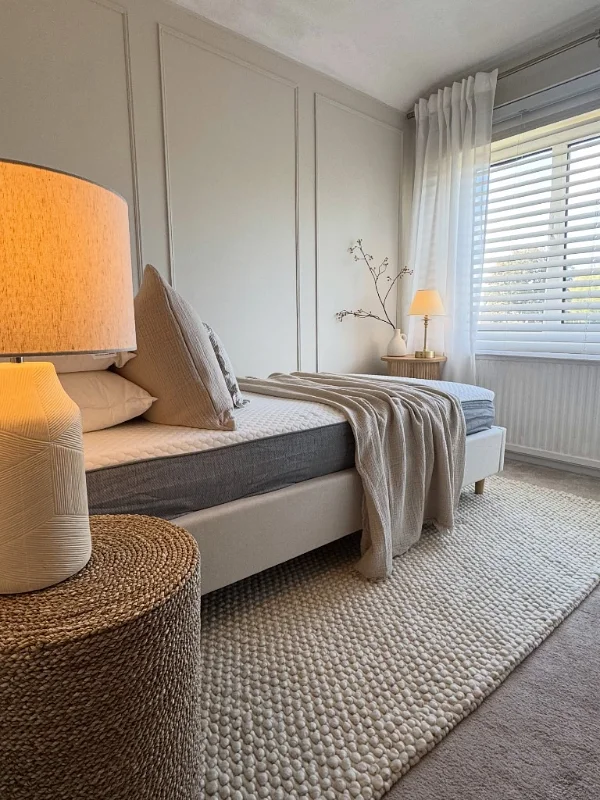 Parallel Bed Placement with Large Woven Rug